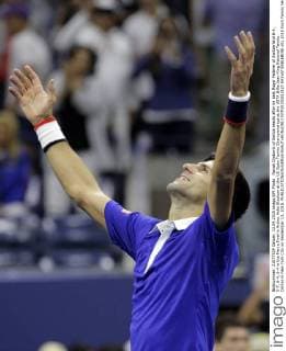 Novak Djokovic of Serbia reacts after he beat Roger Federer of Switzerland 6-4, 5-7, 6-4, 6-4 in the Men s Final in Arthur Ashe Stadium at the US Open Tennis Championships at the USTA Billie Jean King National Tennis Center in New York City on September 13, 2015.  NYP20150913827 RAYxSTUBBLEBINE