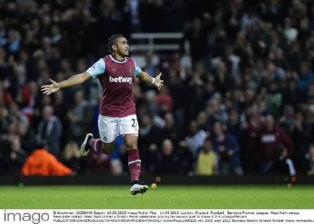 14.09.2015. London, England. Football - Barclays Premier League. West Ham versus Newcastle United. West Ham United s Dimitri Payet celebrates scoring his second goal to make it 2-0 xCraigxMercerx  ActionPlus11660226