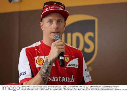 (150917) -- SINGAPORE, Sept. 17, 2015 -- Ferrari s driver Kimi Raikkonen of Finland attends a promotion event ahead of Singapore F1 Grand Prix Night Race in Singapore, Sept. 17, 2015. Singapore F1 Grand Prix Night Race will be held from Sept. 18 to 20 at the Marina Bay Street Circuit. ) (SP)SINGAPORE-F1 GRAND PRIX NIGHT RACE-PROMOTIONAL EVENT BaoxXuelin 