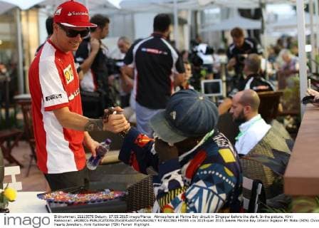 Atmosphere at Marina Bay circuit in Singapur before the start. In the picture, Kimi Raikkonen. xRUBIOx  RV RACING PRESS