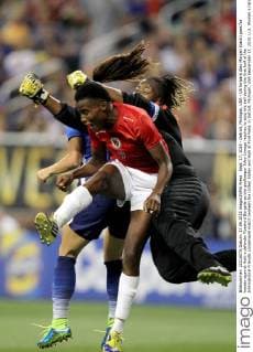 Sept. 17, 2015 - Detroit, Michigan, USA - US forward Alex Morgan (back) goes for header against Haiti s defender Roselord Borgella as the goalkeeper Edny Limage reaches to stop the ball during the first half of the International Friendly Länderspiel match between the United States and Haiti at Ford Field, in Detroit, Michigan, USA September 17, 2015. U.S. Women s national team Nationalteam vs. Haiti  - ZUMAn230