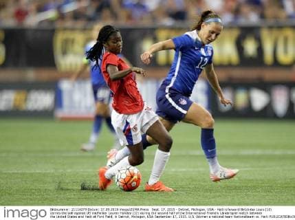 Sept. 17, 2015 - Detroit, Michigan, USA - Haiti s forward Betcheba Louis (10) carries the ball against US midfielder Lauren Holiday (12) during the second half of the International Friendly Länderspiel match between the United States and Haiti at Ford Field, in Detroit, Michigan, USA September 17, 2015. U.S. Women s national team Nationalteam vs. Haiti  - ZUMAn230