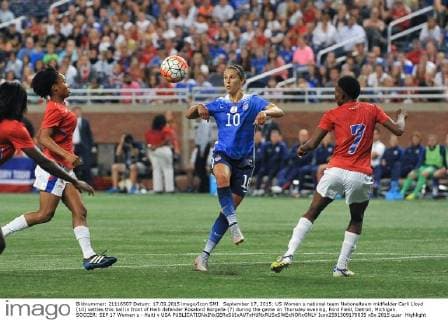 September 17, 2015: US Women s national team Nationalteam midfielder Carli Lloyd (10) settles this ball in front of Haiti defender Roselord Borgella (7) during the game on Thursday evening, Ford Field, Detroit, Michigan. SOCCER: SEP 17 Women s - Haiti v USA Icon2581509170035 EDITORIAL USE ONLY
