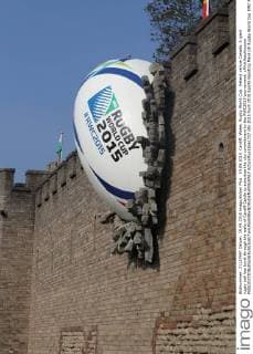 19.09.2015. Cardiff, Wales. Rugby World Cup. Ireland versus Canada. A giant rugby ball has burst through the walls of Cardiff Castle to advertise the city commitment to the RWC2015 tournament. xPhilxHutchinsonx  ActionPlus11661727