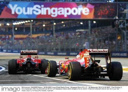 Singapore Grand Prix 17 - 20 September 2015 19.09.2015 - Free Practice 3, Kimi Raikkonen (FIN) Scuderia Ferrari SF15-T and Sebastian Vettel (GER) Scuderia Ferrari SF15-T 