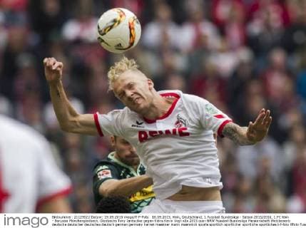 18.09.2015, Köln, Deutschland, 1.Fussball Bundesliga - Saison 2015 2016, 1.FC Köln - Borussia Mönchengladbach, Gladbachs Tony Jantschke gegen Kölns Kevin Vogt