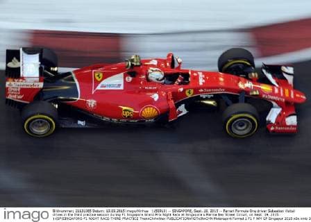 (150919) -- SINGAPORE, Sept. 19, 2015 -- Ferrari Formula One driver Sebastian Vettel drives in the third practice session during F1 Singapore Grand Prix Night Race at Singapore s Marina Bay Street Circuit, on Sept. 19, 2015. ) (SP)SINGAPORE-F1 NIGHT RACE-THIRD PRACTICE ThenxChihxWey 