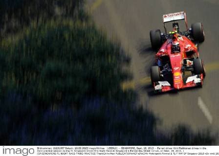 (150919) -- SINGAPORE, Sept. 19, 2015 -- Ferrari driver Kimi Raikkonen drives in the third practice session during F1 Singapore Grand Prix Night Race at Singapore s Marina Bay Street Circuit, on Sept. 19, 2015. ) (SP)SINGAPORE-F1 NIGHT RACE-THIRD PRACTICE ThenxChihxWey 