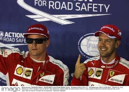 Singapore Grand Prix 17 - 20 September 2015 19.09.2015 - Qualifying, Kimi Raikkonen (FIN) Scuderia Ferrari SF15-T and Sebastian Vettel (GER) Scuderia Ferrari SF15-T pole position 