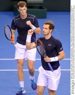 Tennis - 2015 Davis Cup - World Group Semi-Final: Great Britain vs. Australia Day Two . Rubber Three: Doubles Andy Murray (GB) and Jamie Murray (GB) vs. Sam Groth (Aus) and Lleyton Hewitt (Aus). Great Britain s Murray brothers during the match, at the Emirates Arena, Glasgow. COLORSPORT JANE BARLOW 
