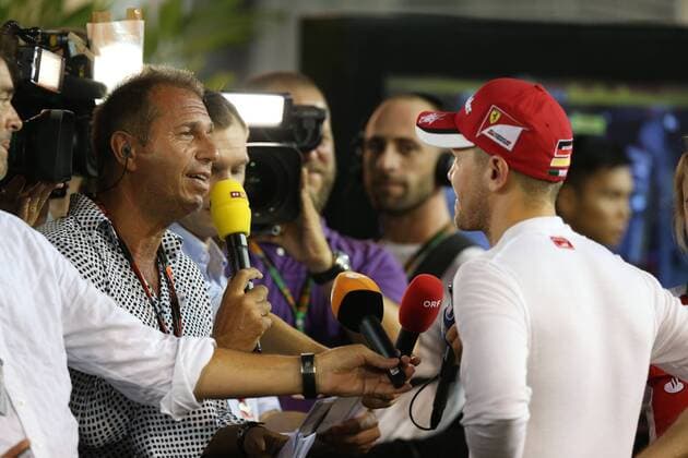 Motorsports: FIA Formula One World Championship WM Weltmeisterschaft 2015, Grand Prix of Singapore, Kai Ebel (GER, RTL Television), 5 Sebastian Vettel (GER, Scuderia Ferrari), xHOCHxZWEIx