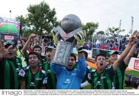 Mexico s players men team celebrates with trophy the final match against Ukraine during the 13th Homeless World Cup on September 19, 2015 in Amsterdam,Netherlands. The 13th Homeless World Cup from 12-19 September at the Museumplein in Amsterdam with 49 Nations and 500 players teams in total taking part. imago Paulo Amorim