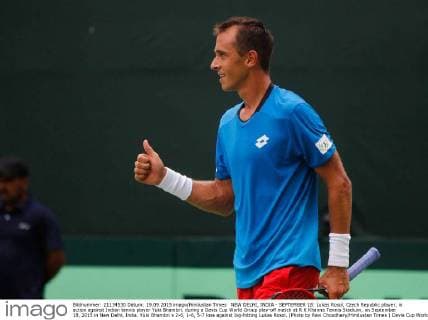 NEW DELHI, INDIA - SEPTEMBER 18: Lukas Rosol, Czech Republic player, in action against Indian tennis player Yuki Bhambri, during a Davis Cup World Group play-off match at R K Khanna Tennis Stadium, on September 18, 2015 in New Delhi, India. Yuki Bhambri s 2-6, 1-6, 5-7 loss against big-hitting Lukas Rosol. (Photo by Ravi Choudhary Hindustan Times ) Davis Cup World Group Play-Off