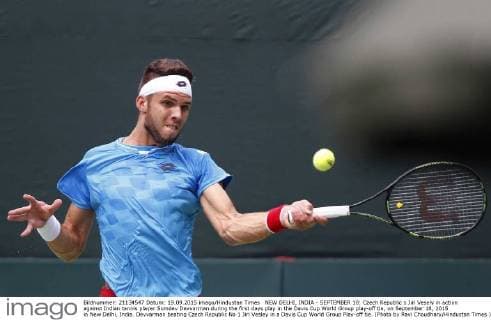 NEW DELHI, INDIA - SEPTEMBER 18: Czech Republic s Jiri Vesely in action against Indian tennis player Somdev Devvarman during the first days play in the Davis Cup World Group play-off tie, on September 18, 2015 in New Delhi, India. Devvarman beating Czech Republic No 1 Jiri Vesley in a Davis Cup World Group Play-off tie. (Photo by Ravi Choudhary Hindustan Times ) Davis Cup World Group Play-Off