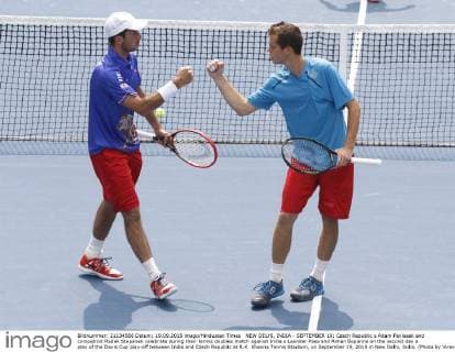 NEW DELHI, INDIA - SEPTEMBER 19: Czech Republic s Adam Pavlasek and compatroit Radek Stepanek celebrate during their tennis doubles match against India s Leander Paes and Rohan Bopanna on the second day s play of the Davis Cup play-off between India and Czech Republic at R.K. Khanna Tennis Stadium, on September 19, 2015 in New Delhi, India. (Photo by Virendra Singh Gosain Hindustan Times ) Davis Cup World Group Play-Off