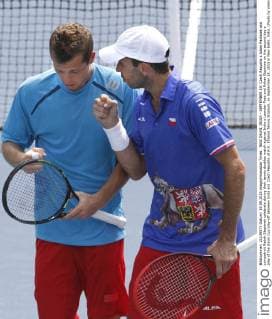NEW DELHI, INDIA - SEPTEMBER 19: Czech Republic s Adam Pavlasek and compatroit Radek Stepanek celebrate during their tennis doubles match against India s Leander Paes and Rohan Bopanna on the second day s play of the Davis Cup play-off between India and Czech Republic at R.K. Khanna Tennis Stadium, on September 19, 2015 in New Delhi, India. (Photo by Virendra Singh Gosain Hindustan Times ) Davis Cup World Group Play-Off