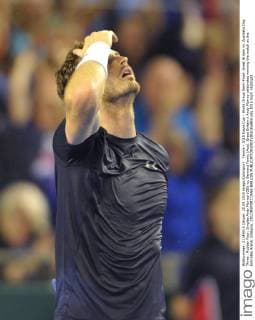 Tennis - 2015 Davis Cup - World Group Semi-Final: Great Britain vs. Australia Day Three . Rubber Four: Singles Andy Murray (GB) vs. Bernard Tomic (Aus). Great Britain s Andy Murray celebrates winning the match at the Emirates Arena, Glasgow. COLORSPORT JANE BARLOW 