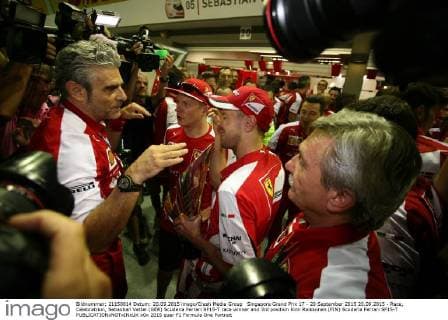 Singapore Grand Prix 17 - 20 September 2015 20.09.2015 - Race, Celebratrion, Sebastian Vettel (GER) Scuderia Ferrari SF15-T race winner and 3rd position Kimi Raikkonen (FIN) Scuderia Ferrari SF15-T 