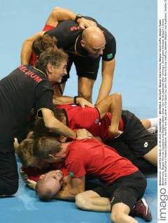 - BRUSSELS, BELGIUM: Belgian Steve Darcis, Belgian David Goffin, Belgian Ruben Bemelmans, Belgian Kimmer Coppejans and Belgian captain Johan Van Herck celebrate after winning a tennis game between Belgium s Steve Darcis and Argentina s Federico Delbonis, the fifth and last game in the Davis Cup semi final World Group meeting between Belgium and Argentina, Sunday 20 September 2015 in Vorst-Forest, Brussels. VIRGINIExLEFOUR  x04704754x