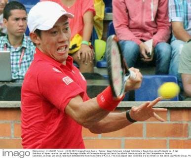 Tennis: Japan hits back to beat Colombia in Davis Cup playoffs World No. 6 Kei Nishikori of Japan returns the ball to Santiago Giraldo of Colombia during the Davis Cup World Group playoffs at Club Campestre in Pereira, Colombia, on Sept. 20, 2015. Nishikori defeated the hometown hero 6-4, 6-2, 7-6(3) as Japan beat Colombia 3-2 to remain in the Davis Cup World Group. 