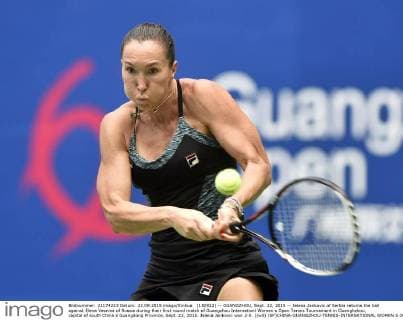 (150922) -- GUANGZHOU, Sept. 22, 2015 -- Jelena Jankovic of Serbia returns the ball against Elena Vesnina of Russia during their first round match of Guangzhou Internationl Women s Open Tennis Tournament in Guanghzhou, capital of south China s Guangdong Province, Sept. 22, 2015. Jelena Jankovic won 2-0. )(wll) (SP)CHINA-GUANGZHOU-TENNIS-INTERNATIONAL WOMEN S OPEN-ROUND 1 LiangxXu 