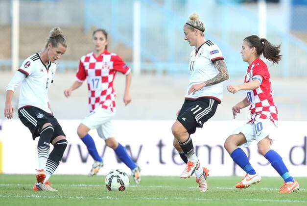 Qualification for UEFA Women s EURO 2017, Croatia - Germany 22.09.2015., Zagreb, Croatia - Qualification for UEFA Women s EURO 2017, group 5, Croatia - Germany. Simone Laudehr, Anja Mittag, Iva Landeka.  SanjinxStrukic PIXSELL
