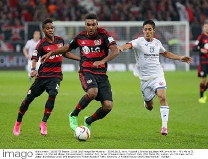 23.09.2015, xovx, Fussball 1.Bundesliga, Bayer 04 Leverkusen - FSV Mainz 05, emspor v.l. Wendell (Bayer 04 Leverkusen), Jonathan Tah (Bayer 04 Leverkusen), Yoshinori Muto (FSV Mainz 05), Aktion.