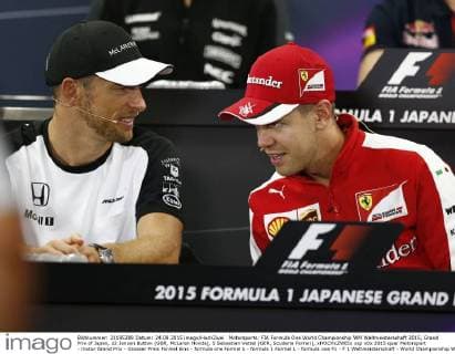 Motorsports: FIA Formula One World Championship WM Weltmeisterschaft 2015, Grand Prix of Japan, 22 Jenson Button (GBR, McLaren Honda), 5 Sebastian Vettel (GER, Scuderia Ferrari), xHOCHxZWEIx