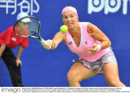 Svetlana Kuznetsova of Dubai returns a shot against Jelena Jankovic of Serbia in their quarterfinal match of the women s singles during the 2015 WTA Tennis Damen Guangzhou Open tennis tournament in Guangzhou city, south China s Guangdong province, 24 September 2015. Jelena Jankovic of Serbia defeated Svetlana Kuznetsova of Dubai 2-0 (6-2 7-5) at their quarterfinal of the women s singles during the 2015 WTA Guangzhou Open tennis tournament. Jelena Jankovic eliminates Svetlana Kuznetsova at quarterfinal of WTA Guangzhou Open  20150924_12465
