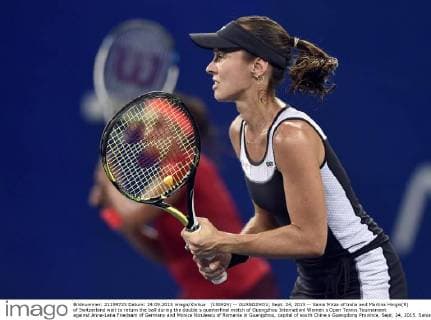 (150924) -- GUANGZHOU, Sept. 24, 2015 -- Sania Mirza of India and Martina Hingis(R) of Switzerland wait to return the ball during the double s quarterfinal match of Guangzhou Internationl Women s Open Tennis Tournament against Anna-Lena Friedsam of Germany and Monica Niculescu of Romania in Guangzhou, capital of south China s Guangdong Province, Sept. 24, 2015. Sania Mirza and Martina Hingis won 2-0. )(wll) (SP)CHINA-GUANGZHOU-TENNIS-INTERNATIONAL WOMEN S OPEN-QUARTERFINAL LiangxXu 