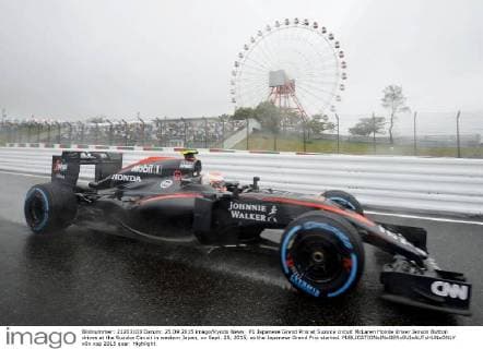 F1 Japanese Grand Prix at Suzuka circuit McLaren Honda driver Jenson Button drives at the Suzuka Circuit in western Japan, on Sept. 25, 2015, as the Japanese Grand Prix started. 