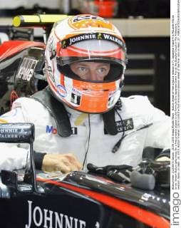 Button ahead of free practice session in F1 Japanese Grand Prix McLaren Honda driver Jenson Button gets ready for a free practice session in the Formula One Japanese Grand Prix at the Suzuka Circuit in Mie Prefecture, western Japan, on Sept. 25, 2015. Button finished 12th in both the first and second session ahead of the final race on Sept. 27. 