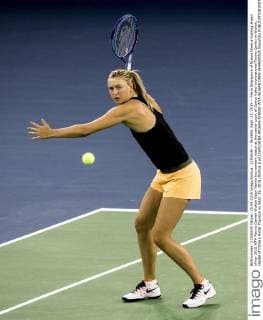 (150925) -- WUHAN, Sept. 25, 2015 -- Maria Sharapova of Russia takes a training ahead of her 2015 WTA Tennis Damen Wuhan Open Tennis tournament match at the center court of Optics Valley International Tennis Center in Wuhan, capital of China s Hubei Province on Sept. 25, 2015.(Xinhua )(wll) (SP)CHINA-WUHAN-TENNIS-WTA-WUHAN OPEN-SHARAPOVA XiaoxYijiu 