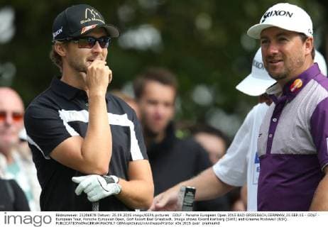 GOLF - Porsche European Open 2015 BAD GRIESBACH,GERMANY,25.SEP.15 - GOLF - European Tour, Porsche European Open, Golf Resort Bad Griesbach. Image shows Rikard Karlberg (SWE) and Graeme Mcdowell (NIR). GEPAxpictures xAndreasxPranter