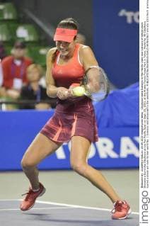 Cibulkova beats Ivanovic in Pan Pacific Open Ana Ivanovic of Serbia plays Slovakia s Dominika Cibulkova at the Pan Pacific Open on Sept. 25, 2015, at the Ariake Tennis Forest Park in Tokyo. World No. 48 Cibulkova scored a shock win over former world No. 1 Ivanovic and advanced to the semifinals. 