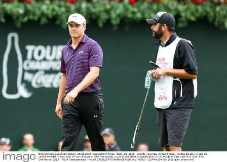 Sept. 25, 2015 - Atlanta, Georgia, United States - Jordan Spieth (L) and his caddie Michael Greller walk off the 18th green after the second round of the TOUR Championship by Coca-Cola at East Lake Golf Club. PGA Golf Herren 2015 - TOUR Championship - Round 2 - ZUMAw109