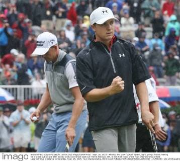 Sept. 26, 2015 - Atlanta, GA, USA - Jordan Spieth, right, pumps his fist making ha is birdie putt on the 18th hole to take a one stroke lead over Henrik Stenson, left, in the third round of the Tour Championship at East Lake Golf Club in Atlanta on Saturday, Sept. 26, 2015. Tour Championship, third round - ZUMAm67_