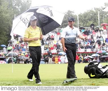 Sept. 26, 2015 - Atlanta, Georgia, United States - Zach Johnson (L) and Paul Casey walk off the 18th green after the third round of the TOUR Championship by Coca-Cola at East Lake Golf Club. PGA Golf Herren 2015 - TOUR Championship - Round 3 - ZUMAw109