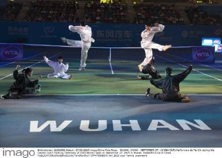 WUHAN, CHINA - SEPTEMBER 27: (CHINA OUT) Performers do Tai Chi during the Central Court Opening Ceremony of 2015 Wuhan Open on September 27, 2015 in Wuhan, Hubei Province of China.  CFP473508675 