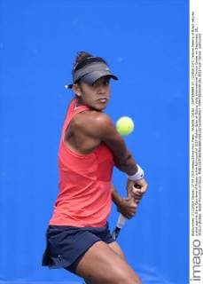WUHAN, CHINA - SEPTEMBER 27: (CHINA OUT) Teliana Pereira of Brazil returns a shot against Daria Gavrilova of Russia in the fist round of 2015 Wuhan Open at Optics Vally International Tennis Center on September 26, 2015 in Wuhan, Hubei Province of China.  CFP473508539 