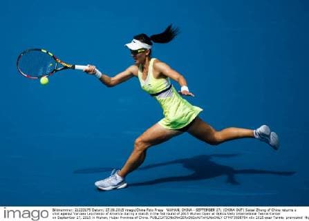 WUHAN, CHINA - SEPTEMBER 27: (CHINA OUT) Saisai Zheng of China returns a shot against Varvara Lepchenko of America during a match in the fist round of 2015 Wuhan Open at Optics Vally International Tennis Center on September 27, 2015 in Wuhan, Hubei Province of China.  CFP473508764 
