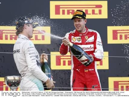 Motorsports: FIA Formula One World Championship WM Weltmeisterschaft 2015, Grand Prix of Japan, 6 Nico Rosberg (GER, Mercedes AMG Petronas Formula One Team), 5 Sebastian Vettel (GER, Scuderia Ferrari), xHOCHxZWEIx