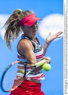 WUHAN, CHINA - SEPTEMBER 27: (CHINA OUT) Elina Svitolina of Ukraine returns a shot against Daniela Hantuchova of Slovakia during a match in the fist round of 2015 Wuhan Open at Optics Vally International Tennis Center on September 27, 2015 in Wuhan, Hubei Province of China.  CFP473512440 