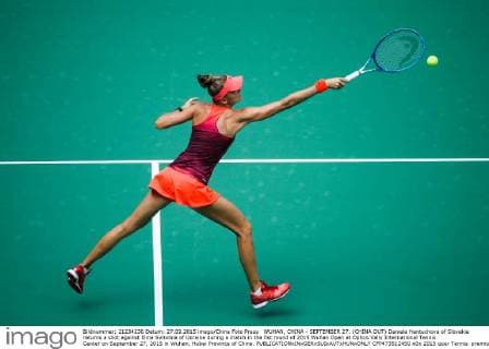 WUHAN, CHINA - SEPTEMBER 27: (CHINA OUT) Daniela Hantuchova of Slovakia returns a shot against Elina Svitolina of Ukraine during a match in the fist round of 2015 Wuhan Open at Optics Vally International Tennis Center on September 27, 2015 in Wuhan, Hubei Province of China.  CFP473512450 