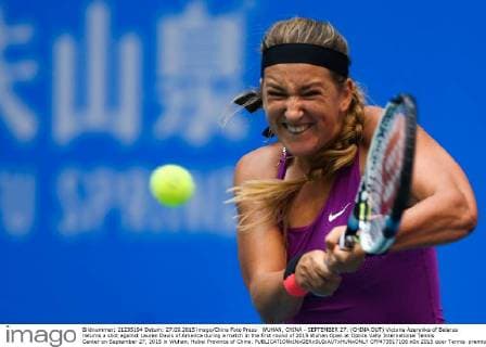 WUHAN, CHINA - SEPTEMBER 27: (CHINA OUT) Victoria Azarenka of Belarus returns a shot against Lauren Davis of America during a match in the first round of 2015 Wuhan Open at Optics Vally International Tennis Center on September 27, 2015 in Wuhan, Hubei Province of China.  CFP473517106 