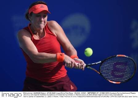 WUHAN, CHINA - SEPTEMBER 27: (CHINA OUT) Anastasia Pavlyuchenkova of Russia returns a shot against Svetlana Kuznetsova of Russia during a match in the first round of 2015 Wuhan Open at Optics Vally International Tennis Center on September 27, 2015 in Wuhan, Hubei Province of China.  CFP473517229 