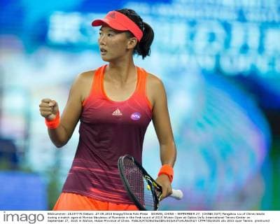 WUHAN, CHINA - SEPTEMBER 27: (CHINA OUT) Fangzhou Liu of China reacts during a match against Monica Niculescu of Romania in the first round of 2015 Wuhan Open at Optics Vally International Tennis Center on September 27, 2015 in Wuhan, Hubei Province of China.  CFP473523025 