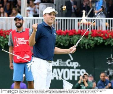Sept. 27, 2015 - Atlanta, GA, USA - Jordan Spieth and his caddie Michael Greller react as he sinks his par putt on the 18th green to win the Tour Championship and the FedEx Cup on Sunday, Sept. 27, 2015, at East Lake Golf Club in Atlanta. Tour Championship Round 4 - ZUMAm67_