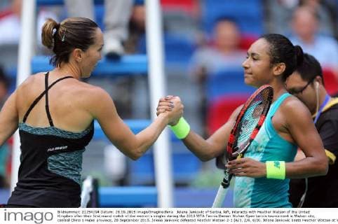 Jelena Jankovic of Serbia, left, interacts with Heather Watson of the United Kingdom after their first round match of the women s singles during the 2015 WTA Tennis Damen Wuhan Open tennis tournament in Wuhan city, central China s Hubei province, 28 September 2015. Jelena Jankovic defeated Heather Watson 2-1 (6 3, 2 6, 6 3). Jelena Jankovic beats Heather Watson at Wuhan Open  20150928_12434