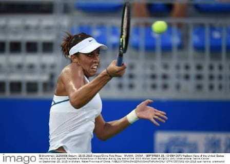 WUHAN, CHINA - SEPTEMBER 28: (CHINA OUT) Madison Keys of the United States returns a shot against Magdalena Rybarikova of Slovakia during day two of the 2015 Wuhan Open at Optics Vally International Tennis Center on September 28, 2015 in Wuhan, Hubei Province of China.  CFP473573162 